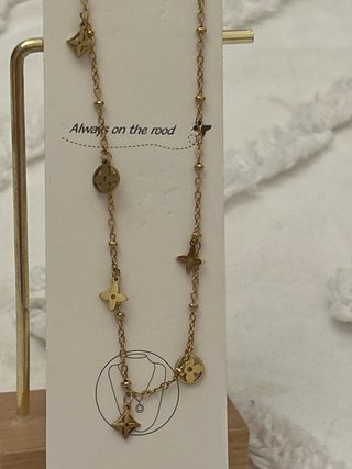 Cadena acero con colgantes flores