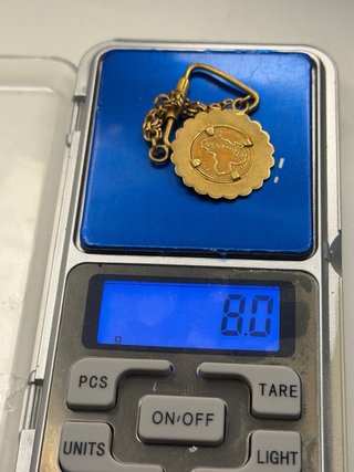 Moneda de oro 18k con cadena