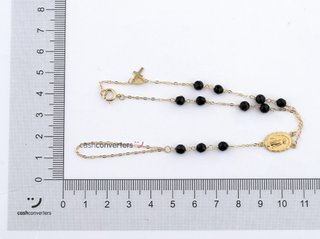 manita oro 18k con piedra con onix