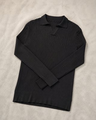 Polo de punto acanalado negro manga larga