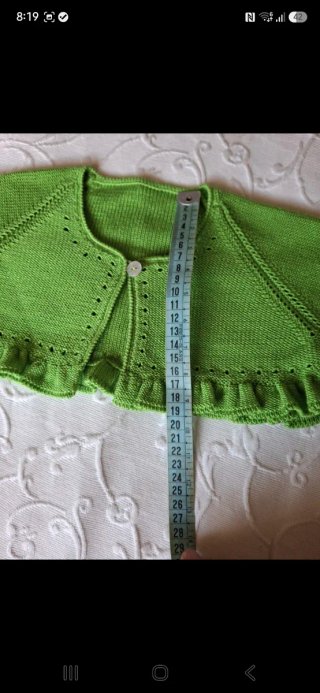 Bolero verde de punto con volantes