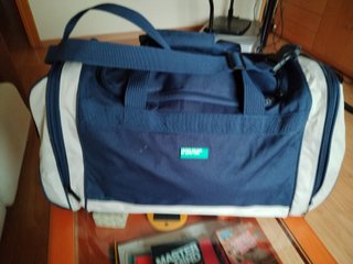 Bolsa de viaje Benetton azul y blanco