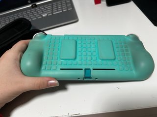 Nintendo switch lite, con funda y 4 juegos