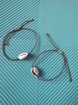 Braccialetti corda intrecciata con conchiglie