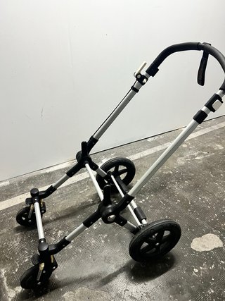 Coche  Bugaboo con funda muy buen estado