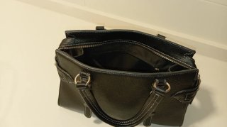 Bolso de mano negro