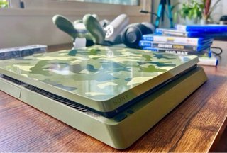 PS4 Slim 1TB + 2 controller + giochi + accessori