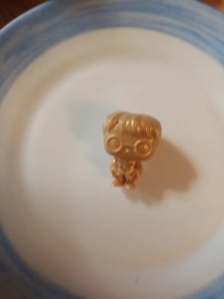 Muñeco Harry Potter Dorado
