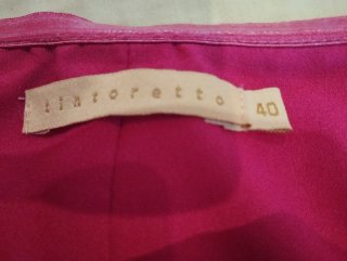 Mono fucsia con detalle trenzado