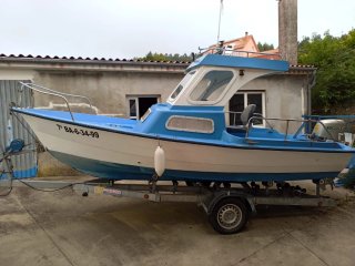 BARCO CON MOTOR Y REMOLQUE