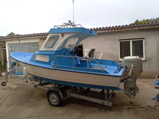BARCO CON MOTOR Y REMOLQUE