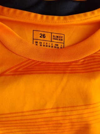 Equipaciones Real Madrid Naranja  y blanca