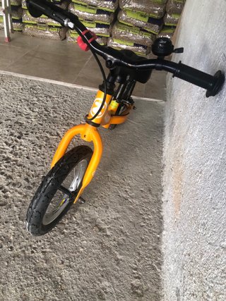 Bicicleta de equilibrio infantil naranja