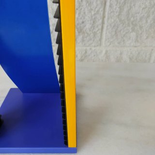 Organizador de CDs azul y amarillo