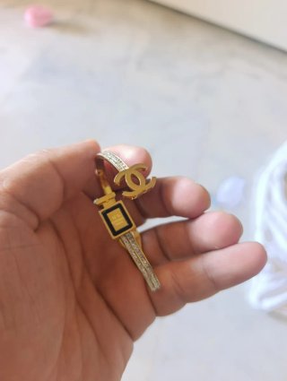 Pulsera y Anillo Chanel Dorado