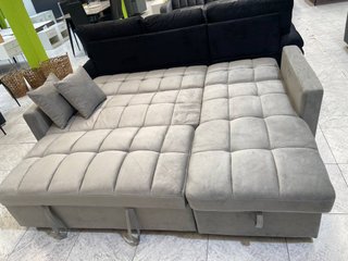 Chaise longue gris con cama y arcón