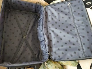 Maleta azul de viaje
