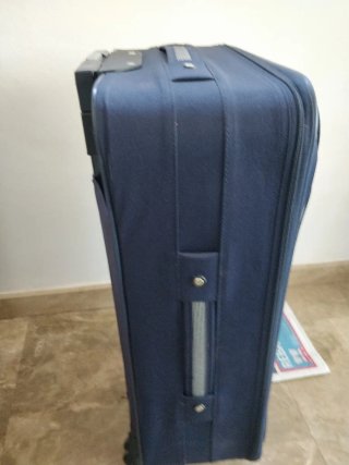 Maleta azul de viaje