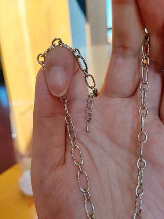 Collana con mela e stella