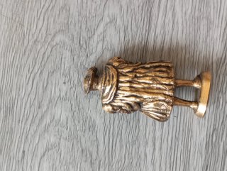 Scultura in metallo dorato
