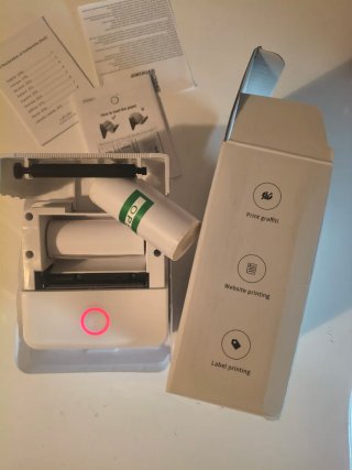 Mini inkless thermal printer for shipping labels
