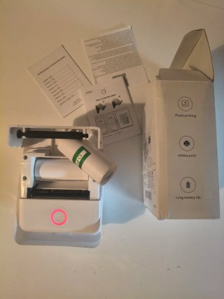 Mini inkless thermal printer for shipping labels