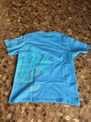 Camiseta Syna World azul – Como nueva