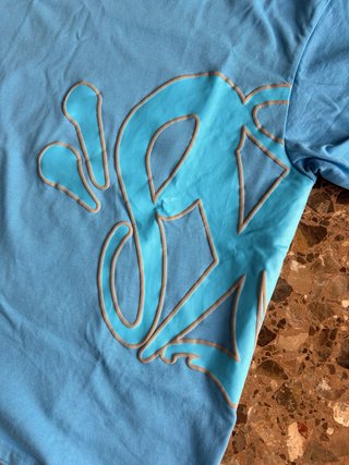 Camiseta Syna World azul – Como nueva