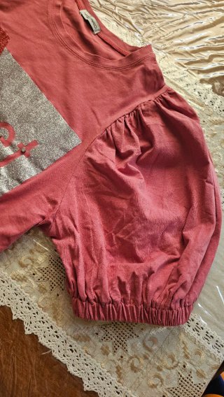 Maglia con maniche a sbuffo e dettagli glitterati