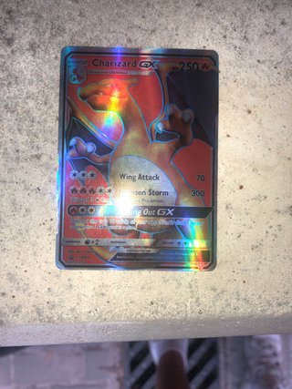 Cartas Pokémon Charizard GX y Incineroar GX