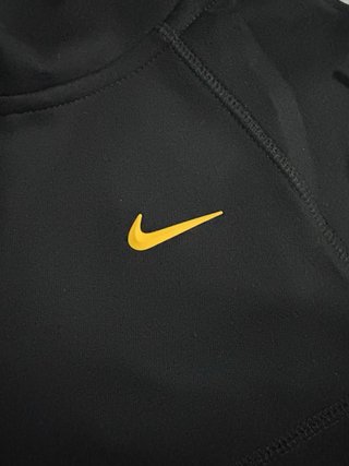 Conjunto Nike NOCTA Negro/Dorado