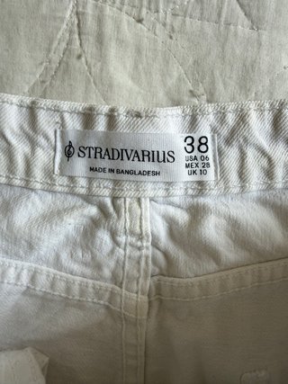 Falda Stradivarius vaquera blanca desgastada T. 38
