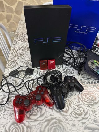 PlayStation 2 Nera Completa di Giochi e Accessori