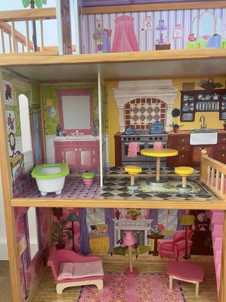 Casa de muñecas con mobiliario Kidkraft