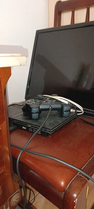 Consola Sony PlayStation 2 Negra + televisor OKI