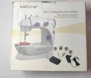 Máquina de coser Krühner con pedal