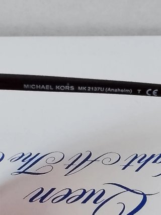 Occhiali da sole Michael Kors neri e rossi