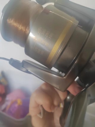 Carrete de pesca Golden Long Cast