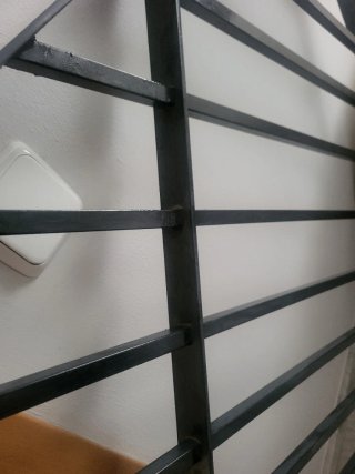 Pareja de rejas de hierro macizo