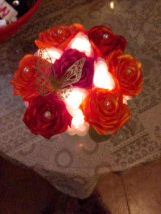 Ramo de flores de tela naranja y rojo Son casera