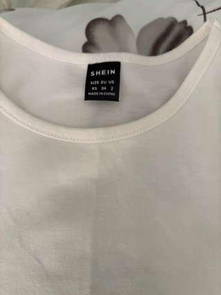 Top estampado marino