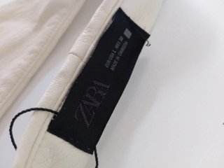 Top Chaleco Zara simil piel con hebillas Talla L