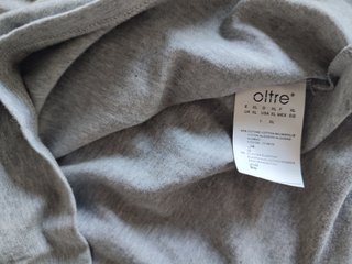 Polo Oltre donna grigio con borchie
