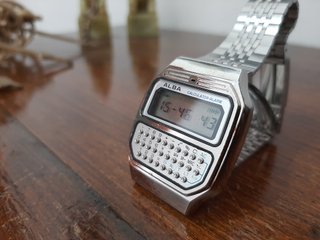 RELOJ ALBA CALCULADORA Y739-5000 BY SEIKO