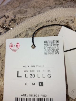 Blusa Zara beige con abalorios T. L