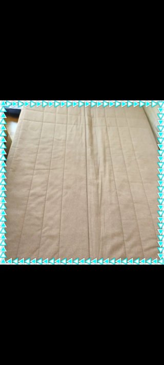 Sofá cama beige de tela