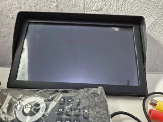 Pantalla de coche con cámara y mando