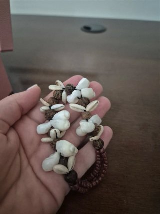 Braccialetto donna conchiglie e semi