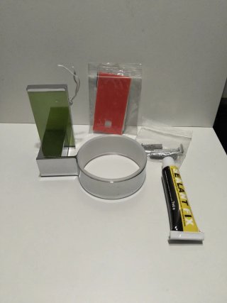 Portavasos de baño verde y plateado