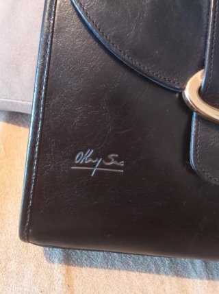 Bolso de mano Mary Kay negro